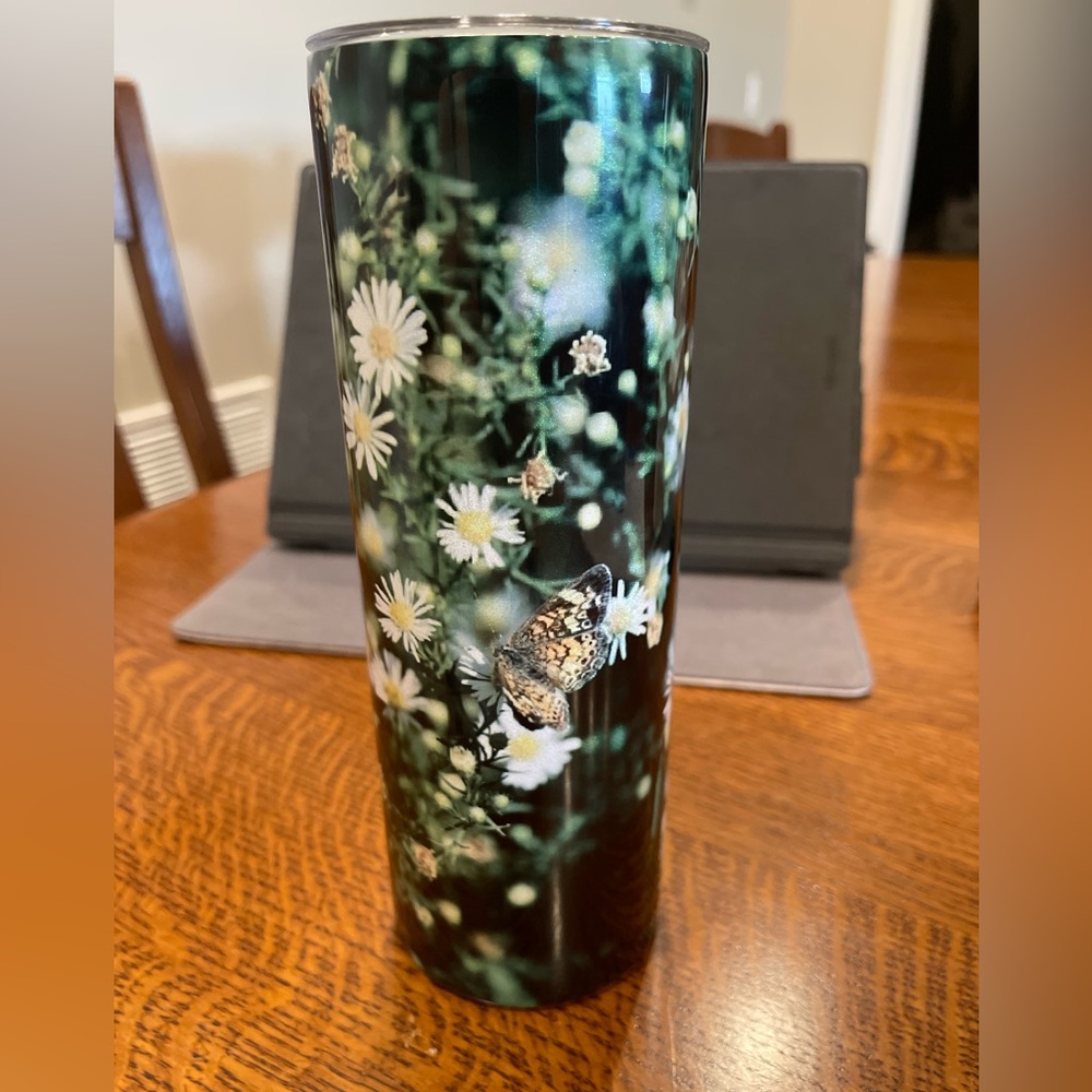 One of a kind 20 ounce stainless steel tumbler with stainless steel straw.